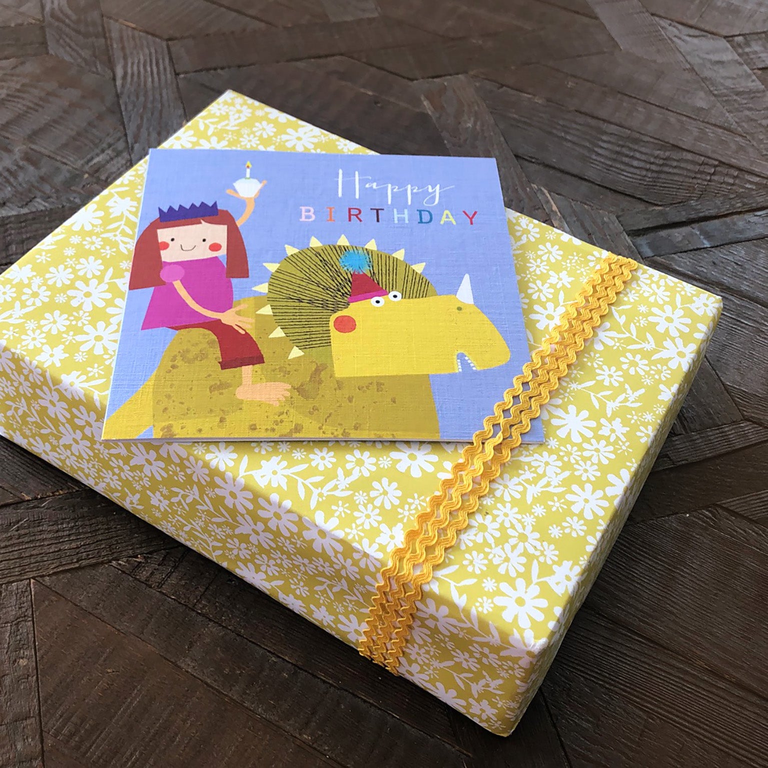 MC23 girl on a dinosaur birthday card