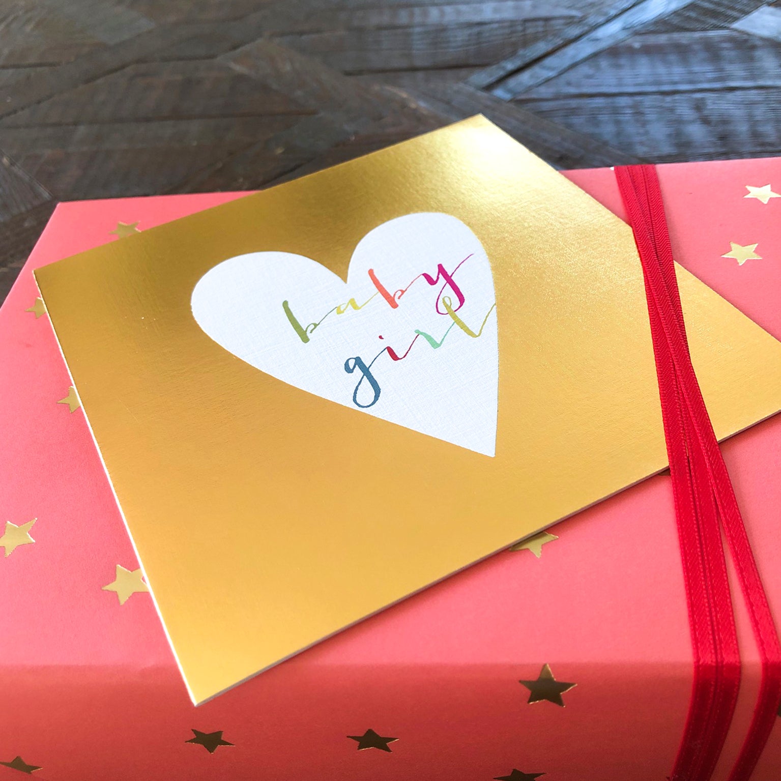 NB40 gold foiled baby girl card