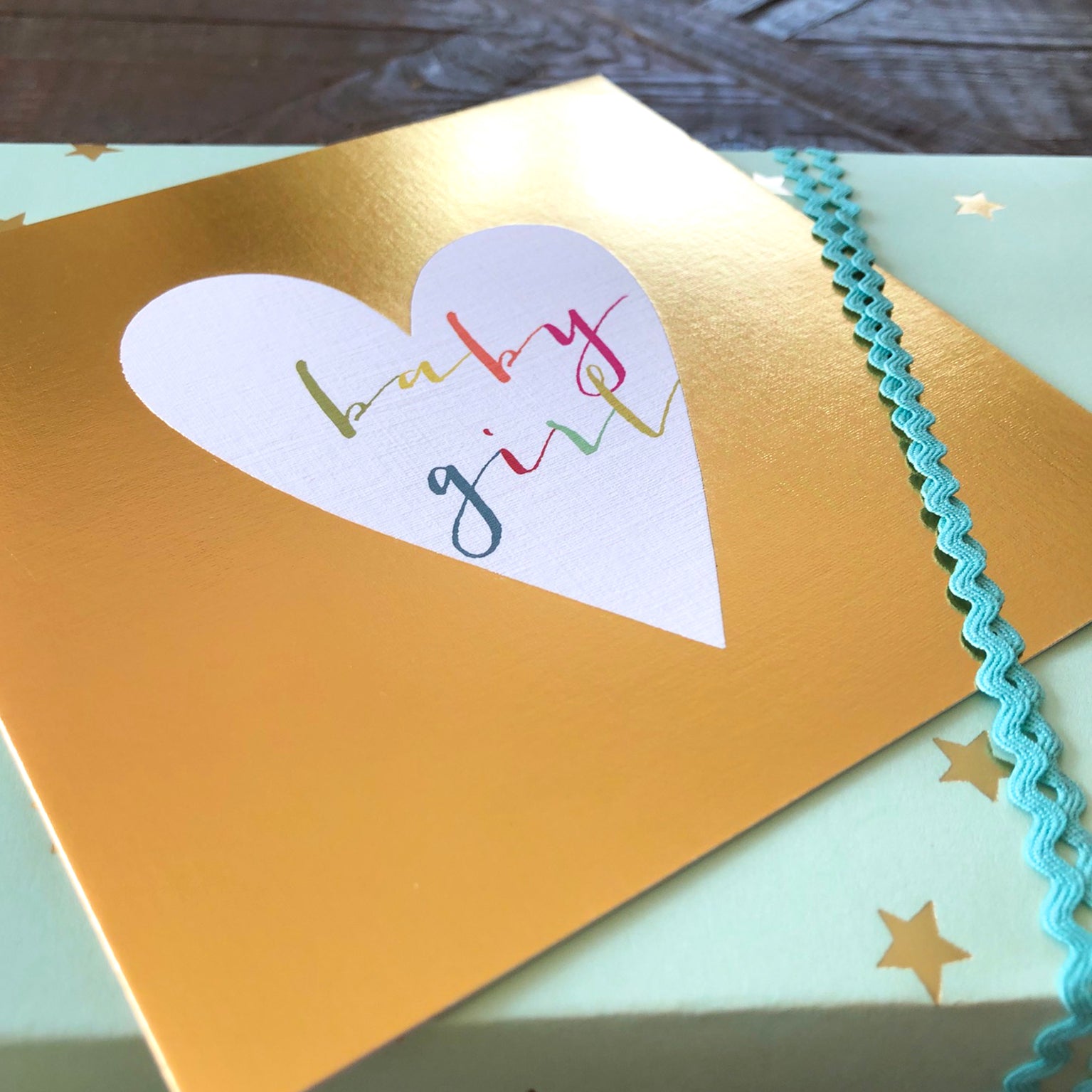 NB40 gold foiled baby girl card