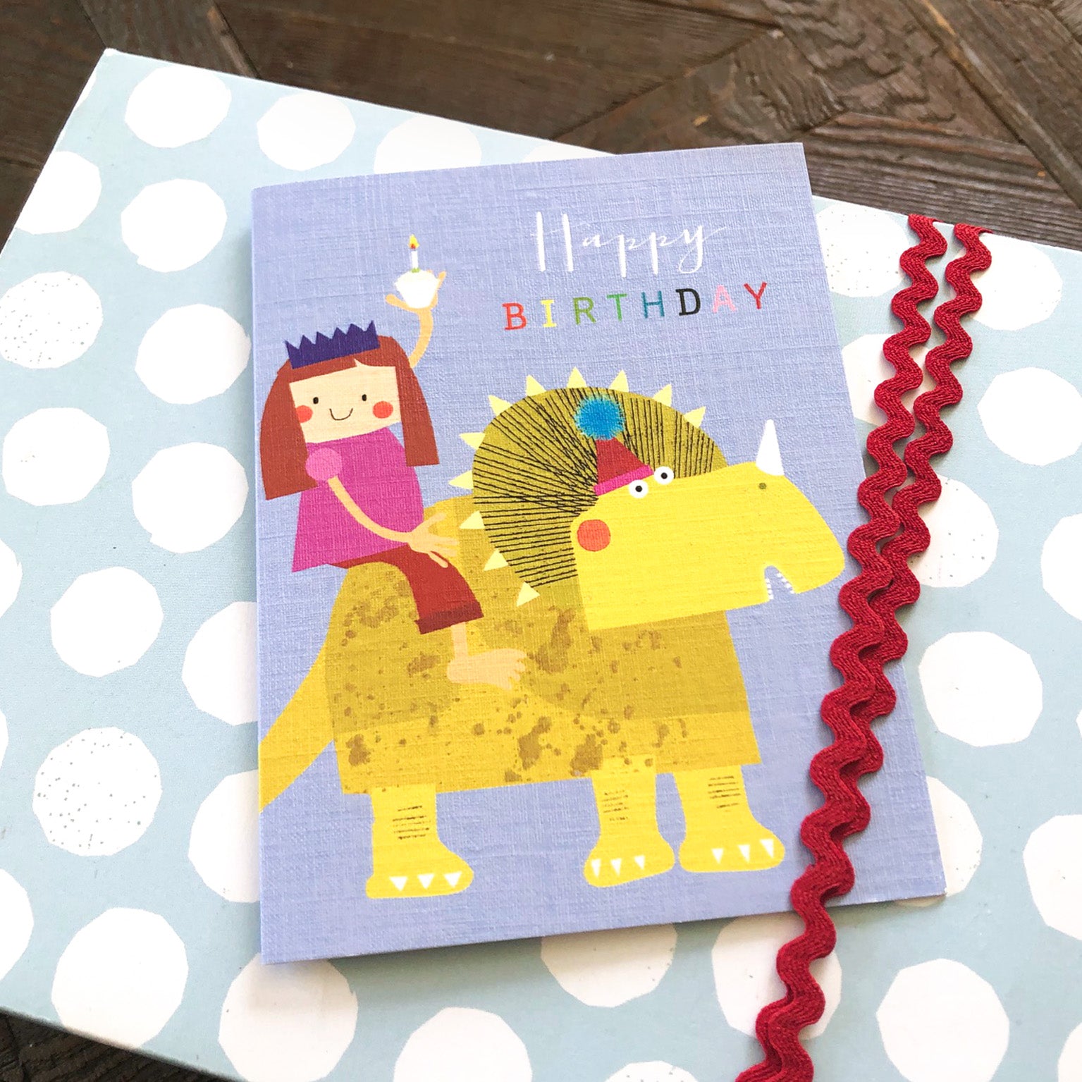 TMC23 mini girl on a dinosaur birthday card