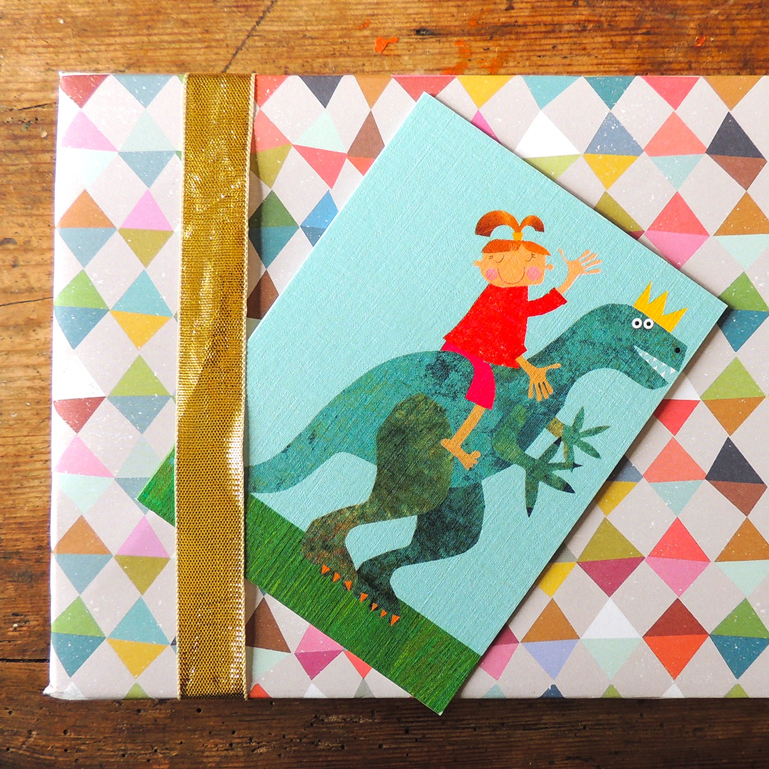 KTW45 mini girl on a dinosaur card