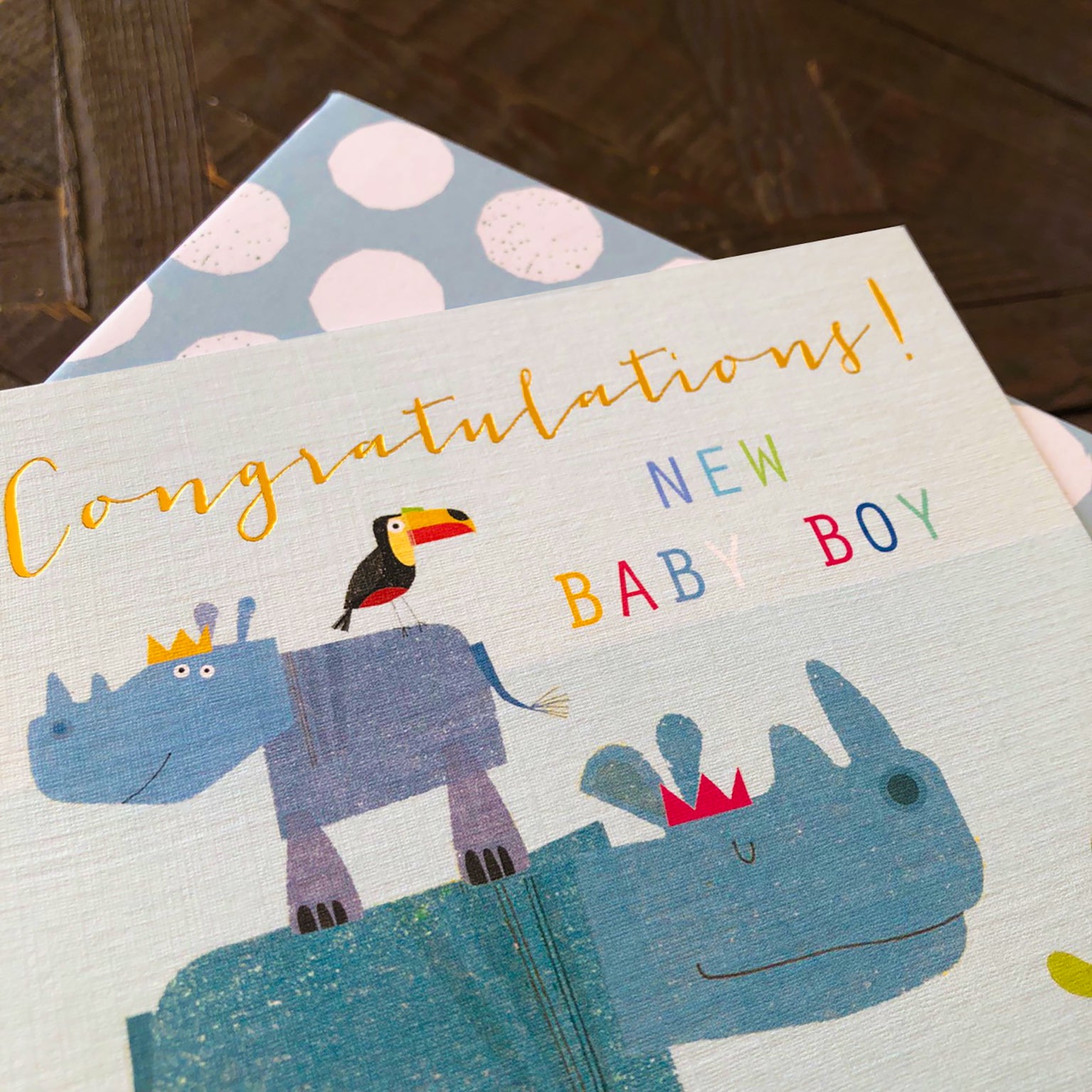 NB09 gold foiled baby boy rhinos card