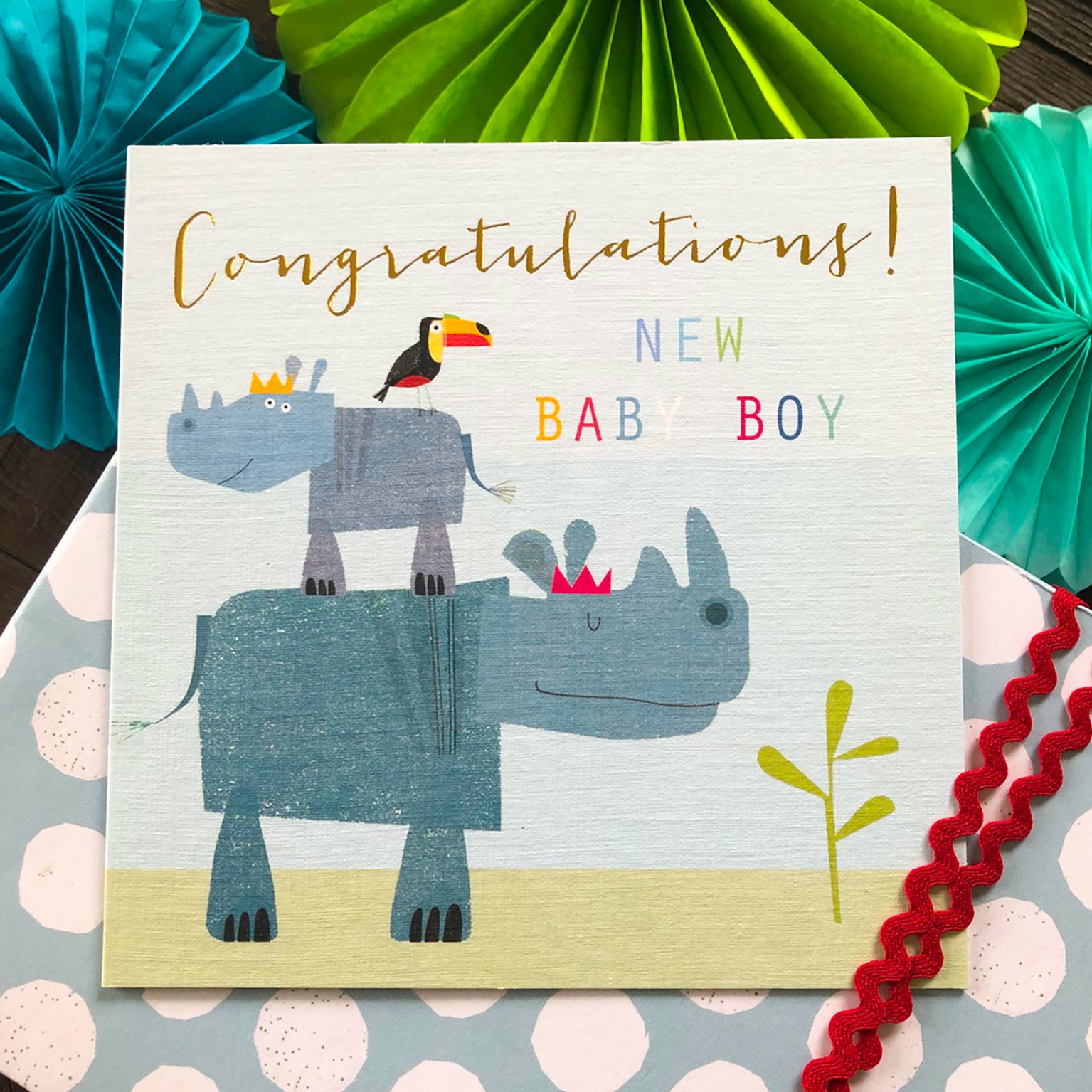 NB09 gold foiled baby boy rhinos card