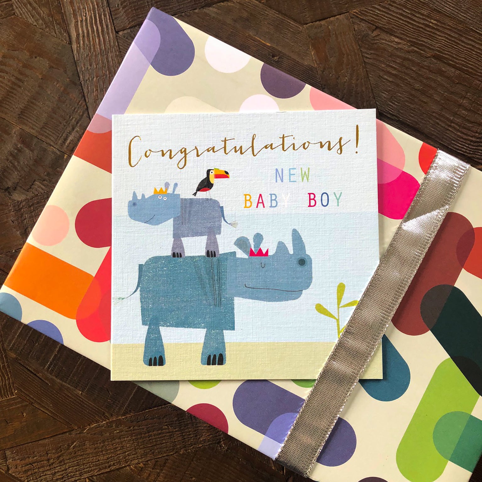 NB09 gold foiled baby boy rhinos card