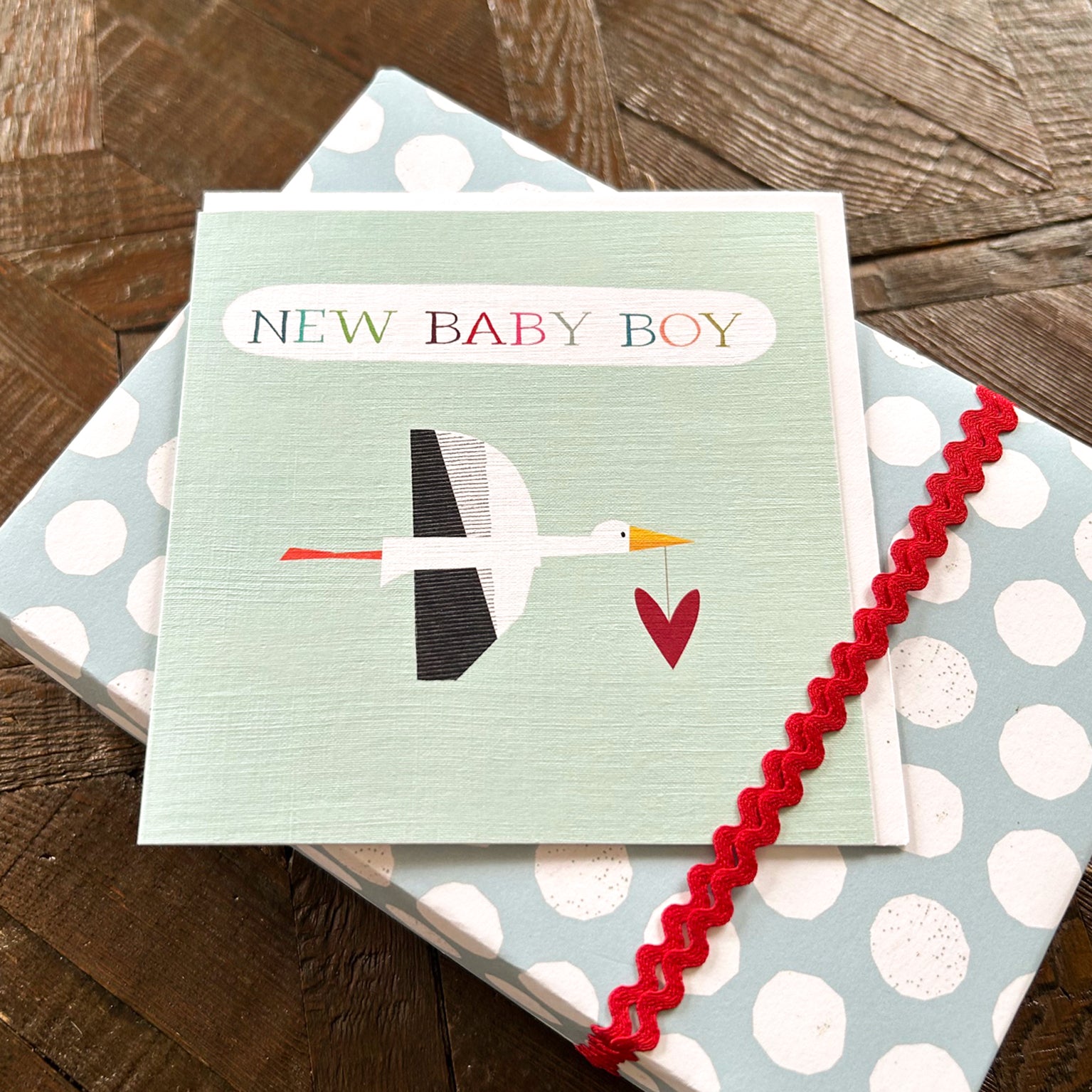 NB35 blue stork baby boy card