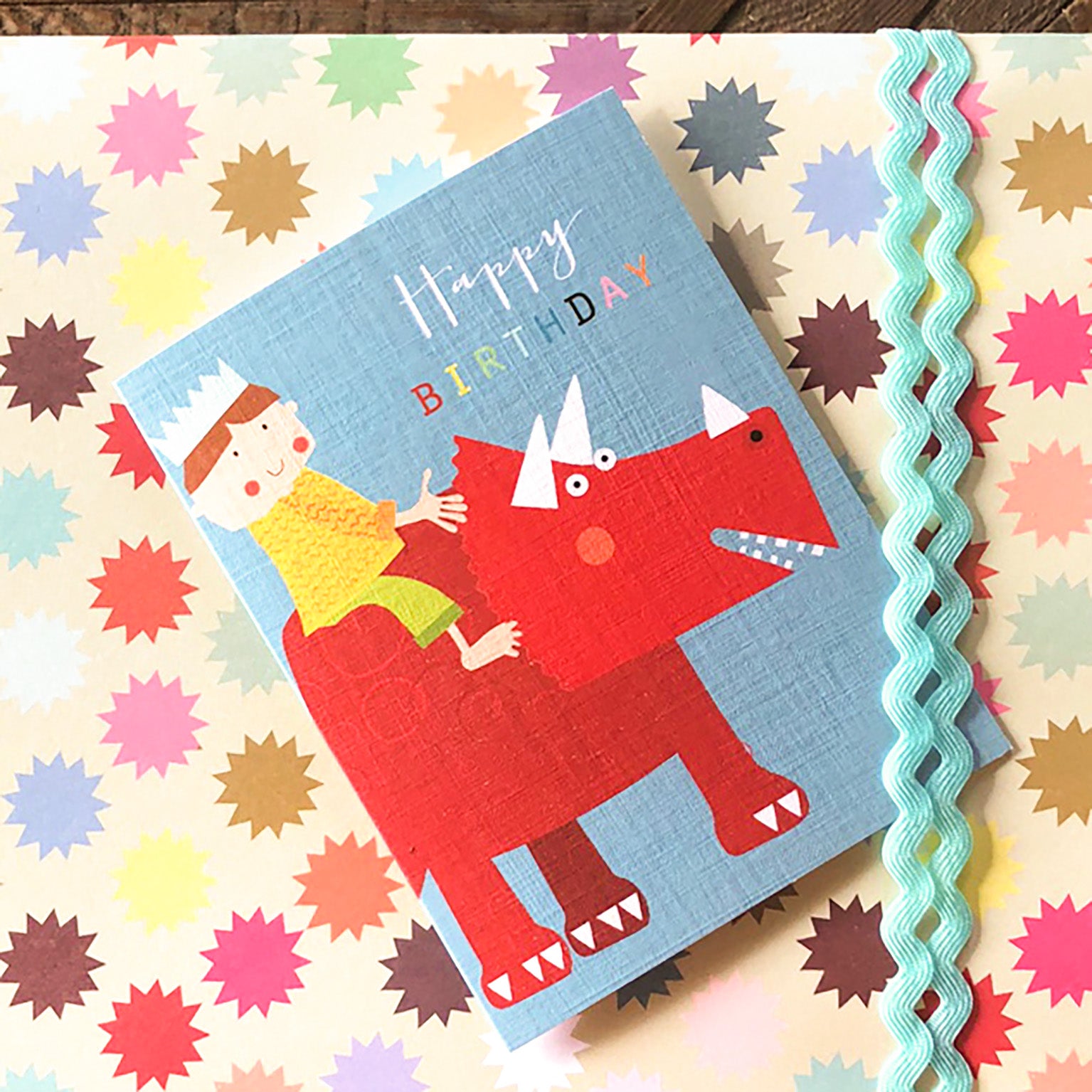 TMC20 mini boy on a dinosaur birthday card